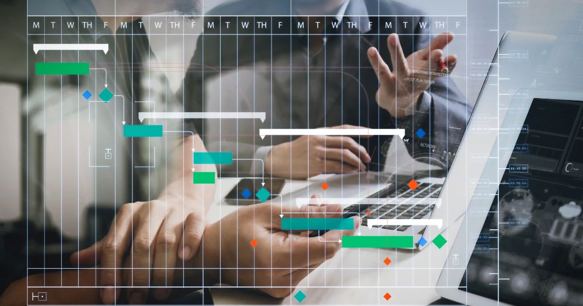 Digital Gantt chart overlay with coloured task bars over two people working at a laptop