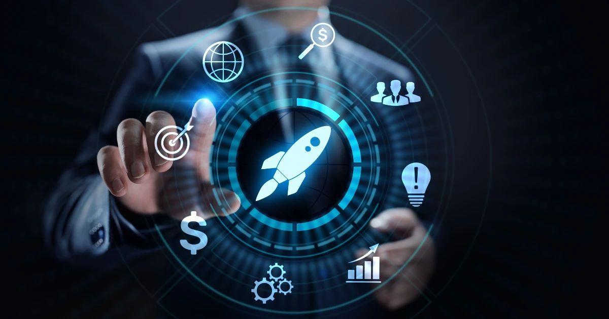 Suited man pointing at a glowing digital interface with rocket icon and business growth icons on dark background