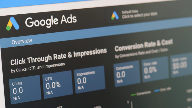 Google Ads overview dashboard showing click through rate, impressions, CTR and conversion rate metrics on screen